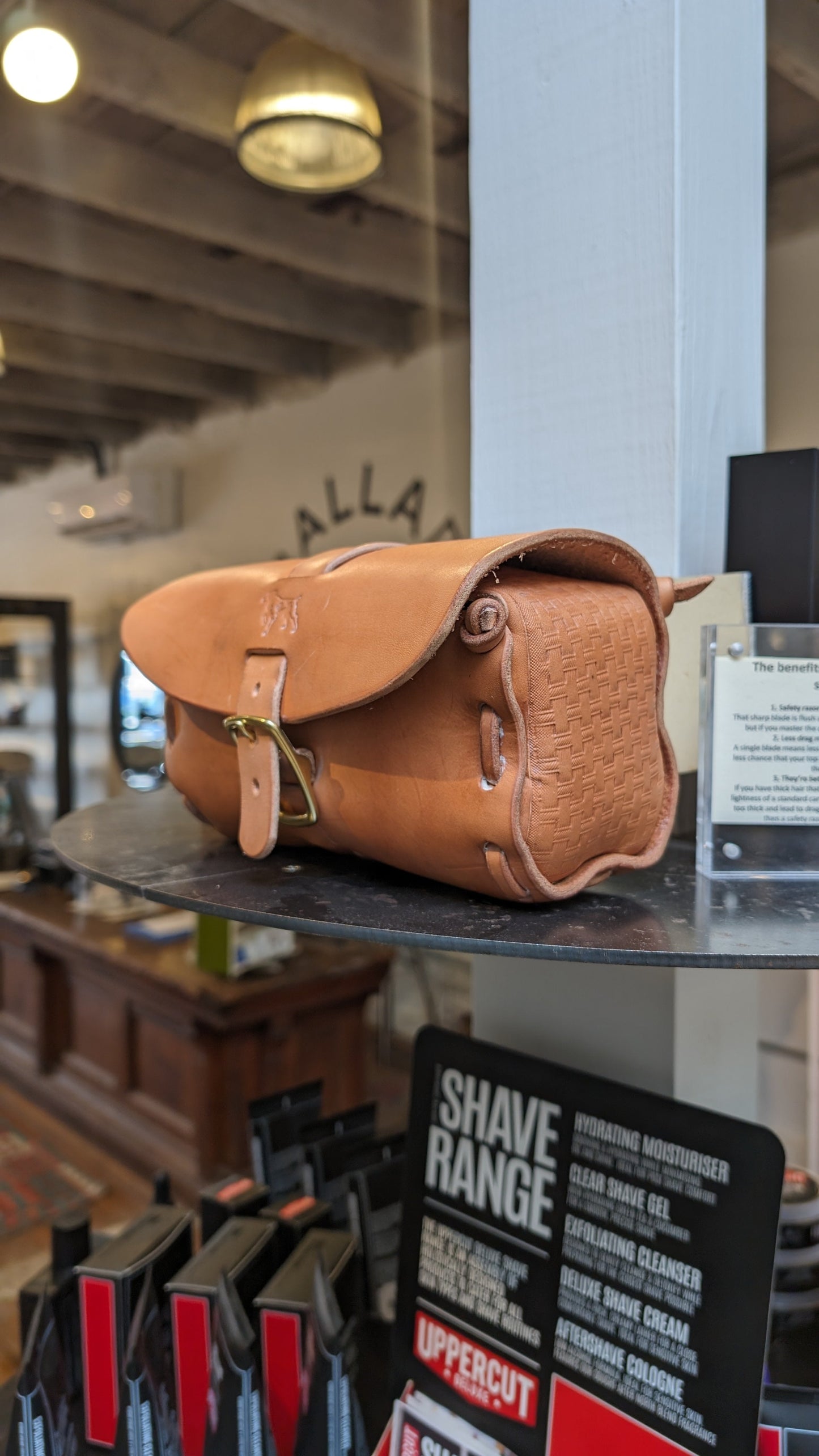 Leather Dopp Kit On Display At Store